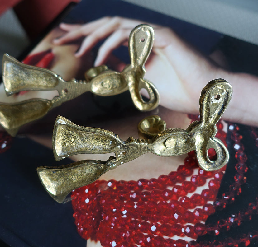 Pair of brass bow hooks