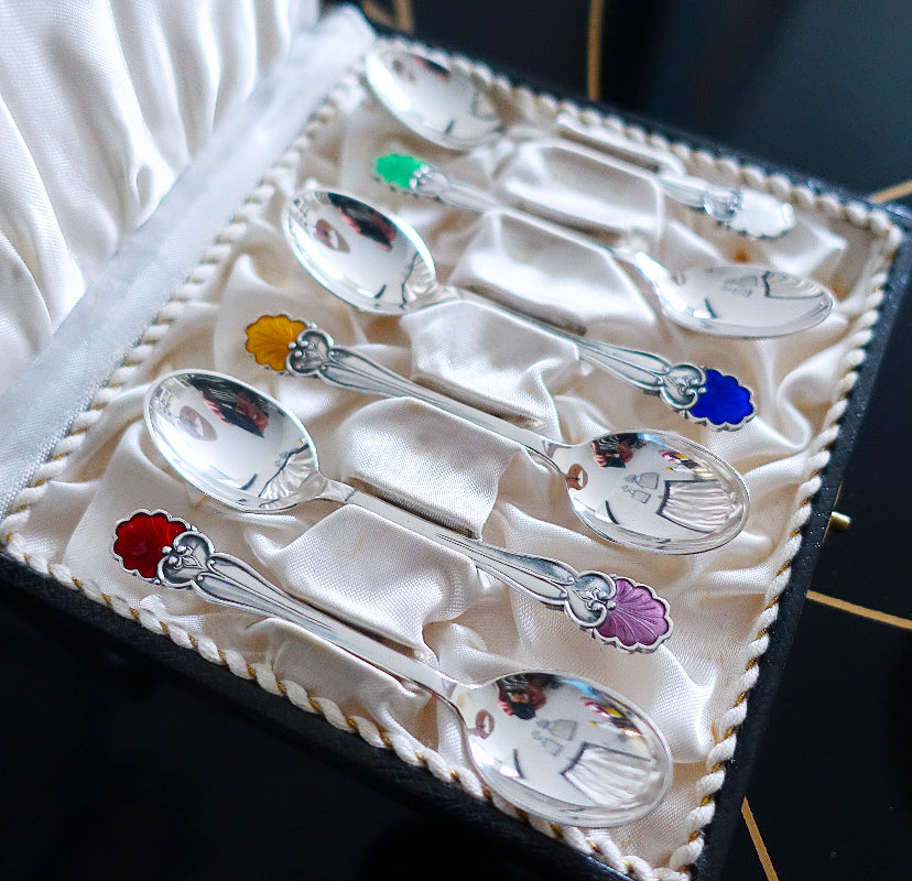 Cased set of six Danish Sterling silver & enamel shell spoons