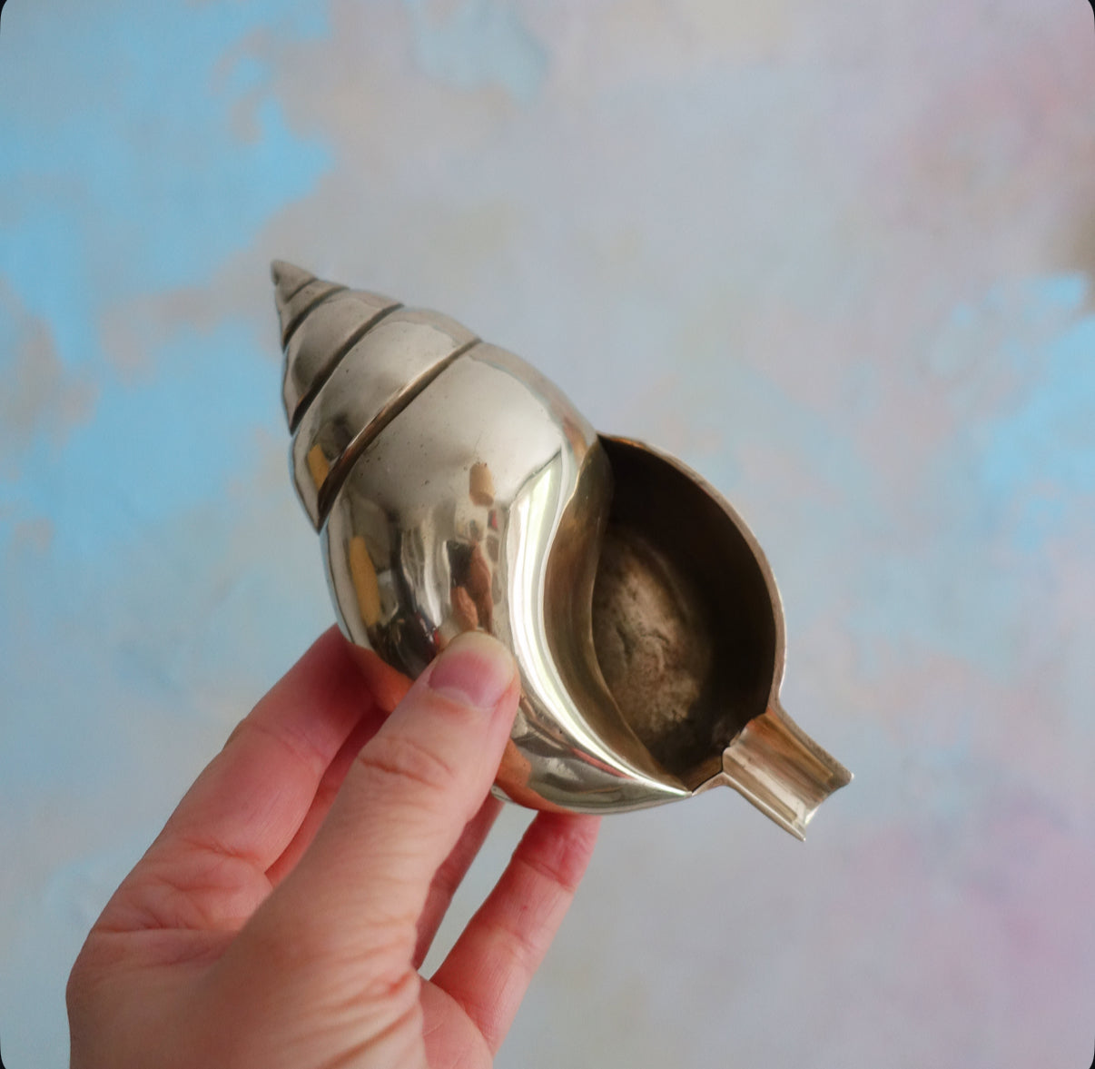 Brass conch shell ashtray