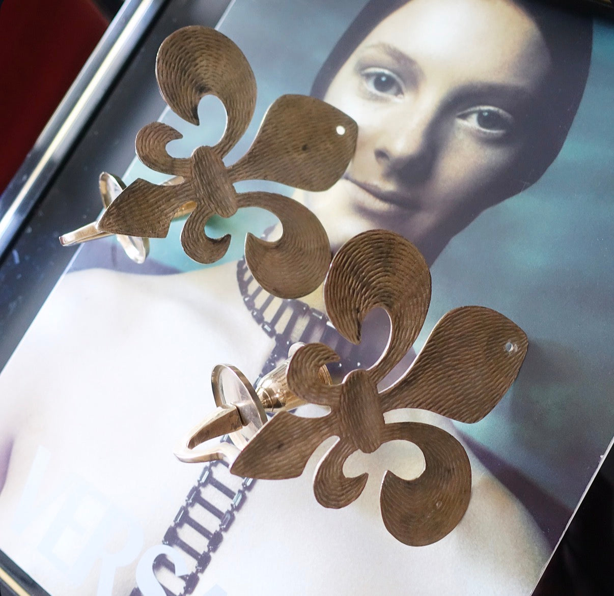 Pair of Fleur-de-lis sconces