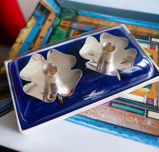 Pair of Swedish clover candle holders