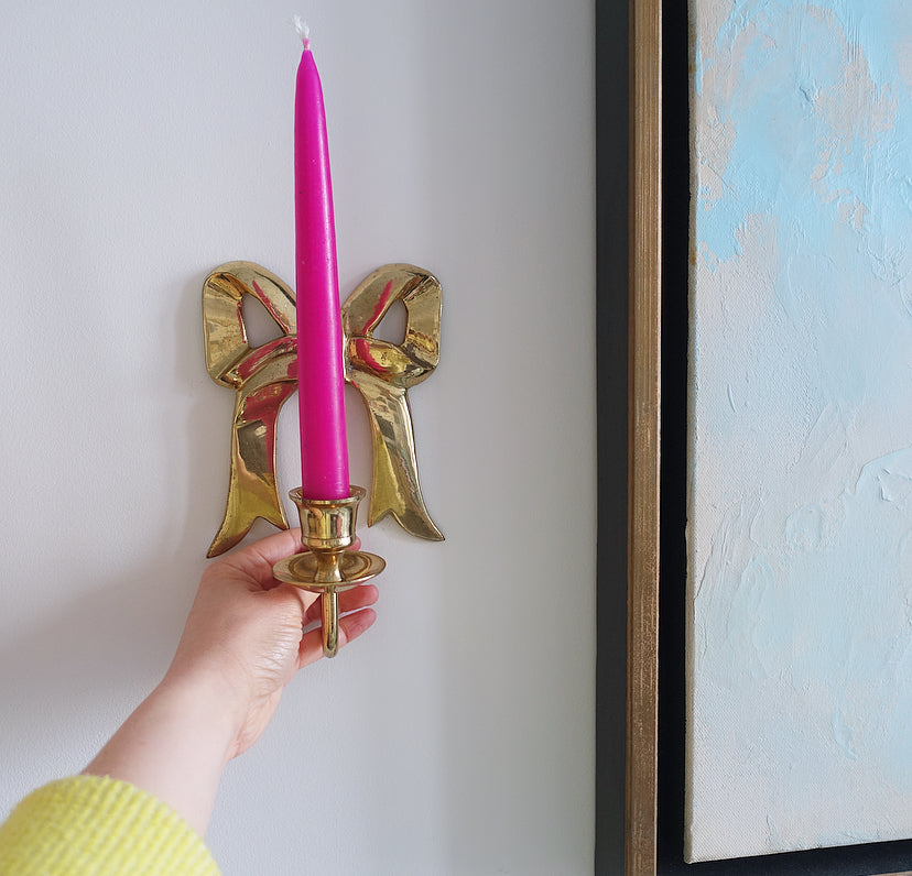 Pair of Hollywood Regency brass bow candle sconces