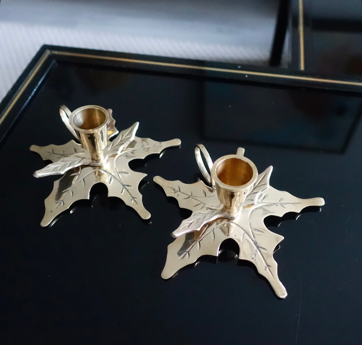 Pair of brass Holly candle holders