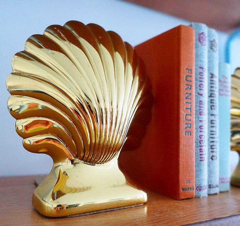 Pair of Hollywood Regency brass shell bookends