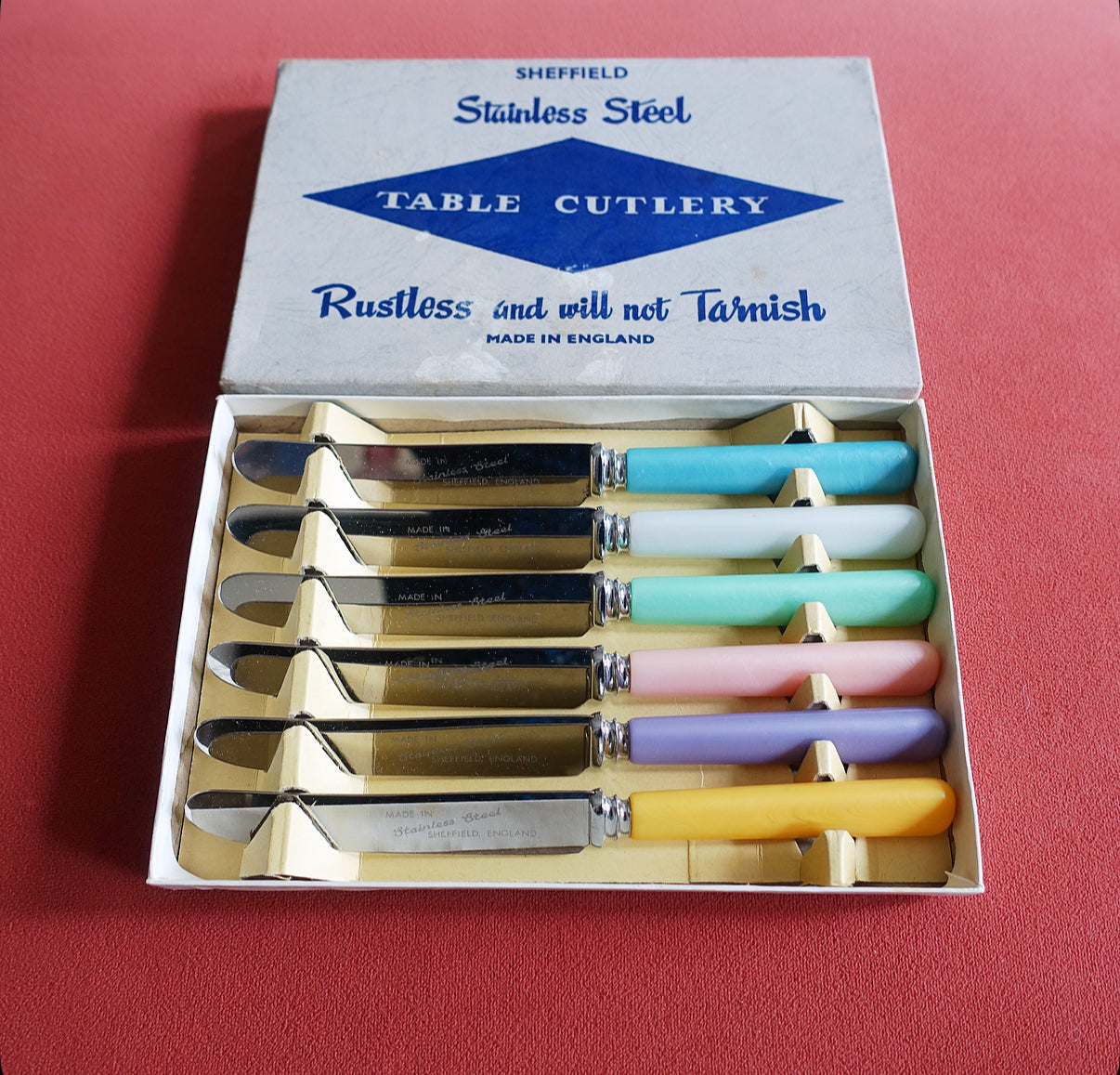 Set of six pastel tea knives
