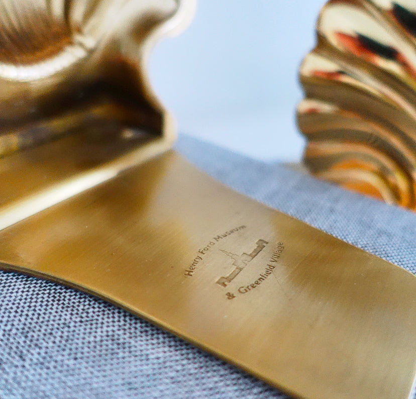 Pair of Hollywood Regency brass shell bookends