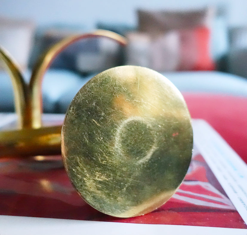 Pair of Swedish brass ‘Lily’ candle holders