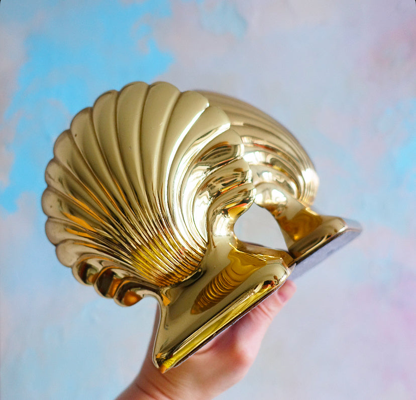 Pair of Hollywood Regency brass shell bookends