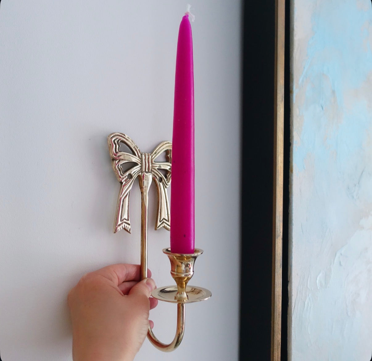 Pair of brass bow candle sconces