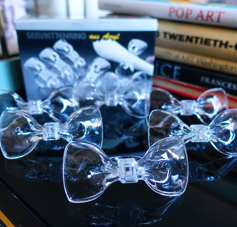 Set of six acrylic bow napkin rings