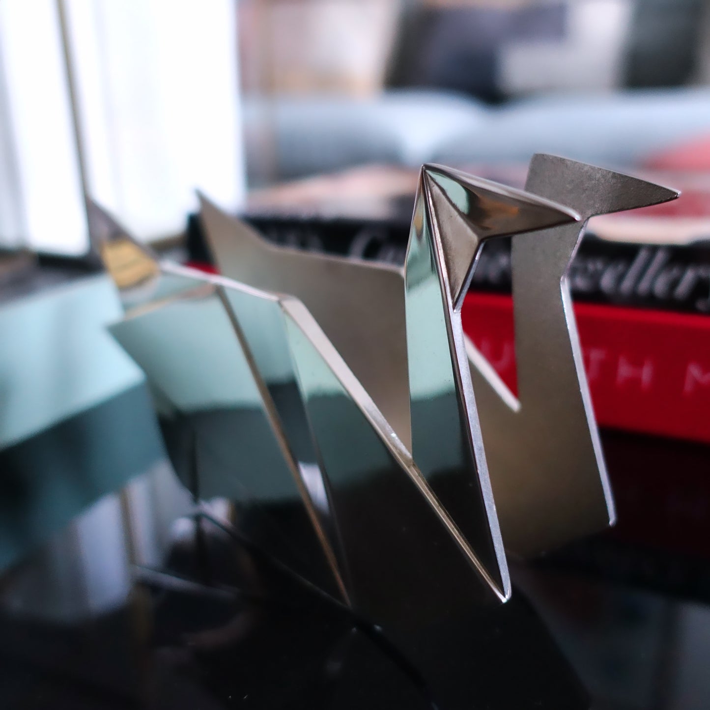 Chrome origami swan napkin holder