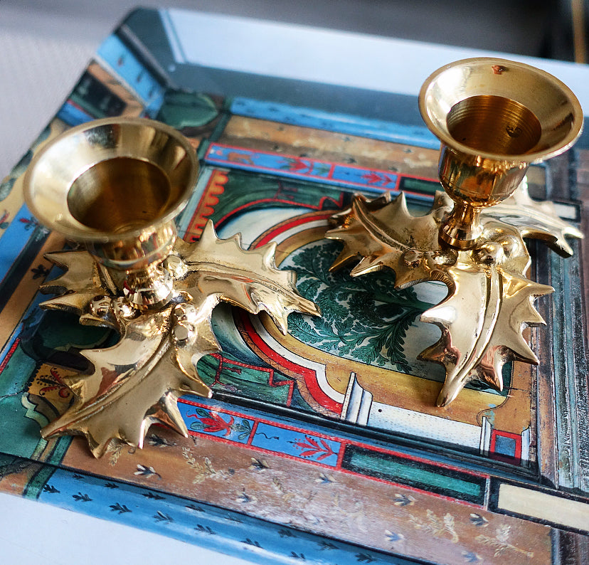 Pair of small brass Holly leaf candle holders