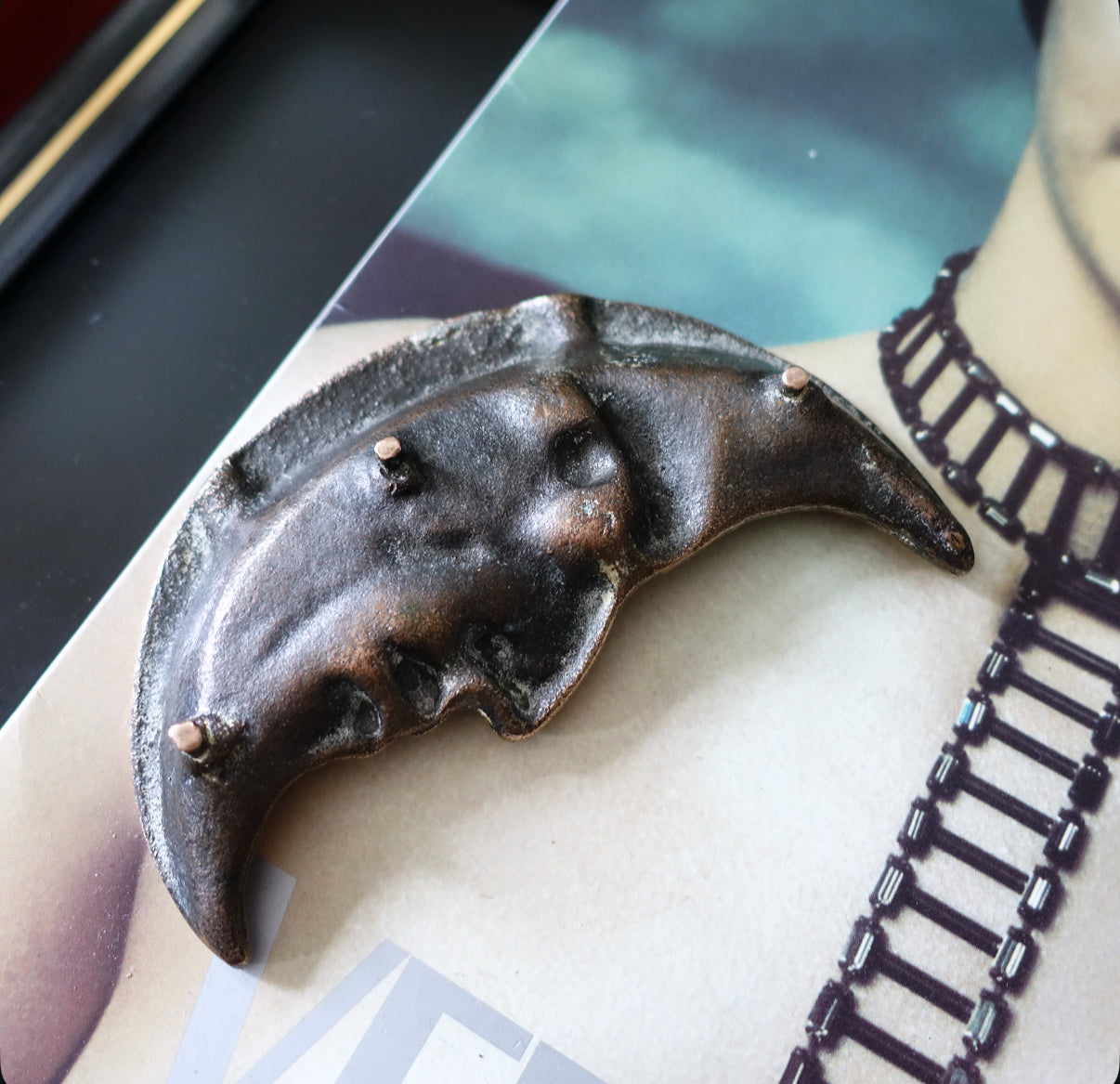 Brass man in the moon ashtray