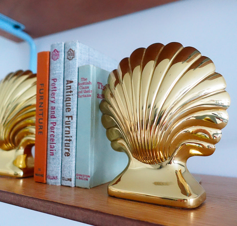 Pair of Hollywood Regency brass shell bookends