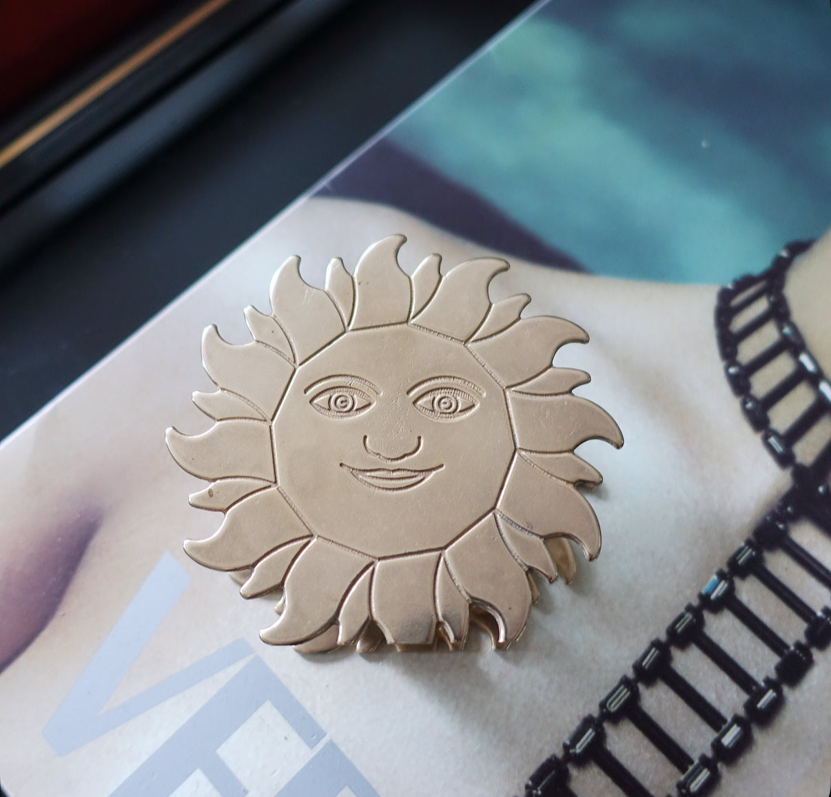 Brass sun letter holder
