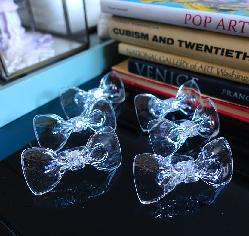 Set of six acrylic bow napkin rings