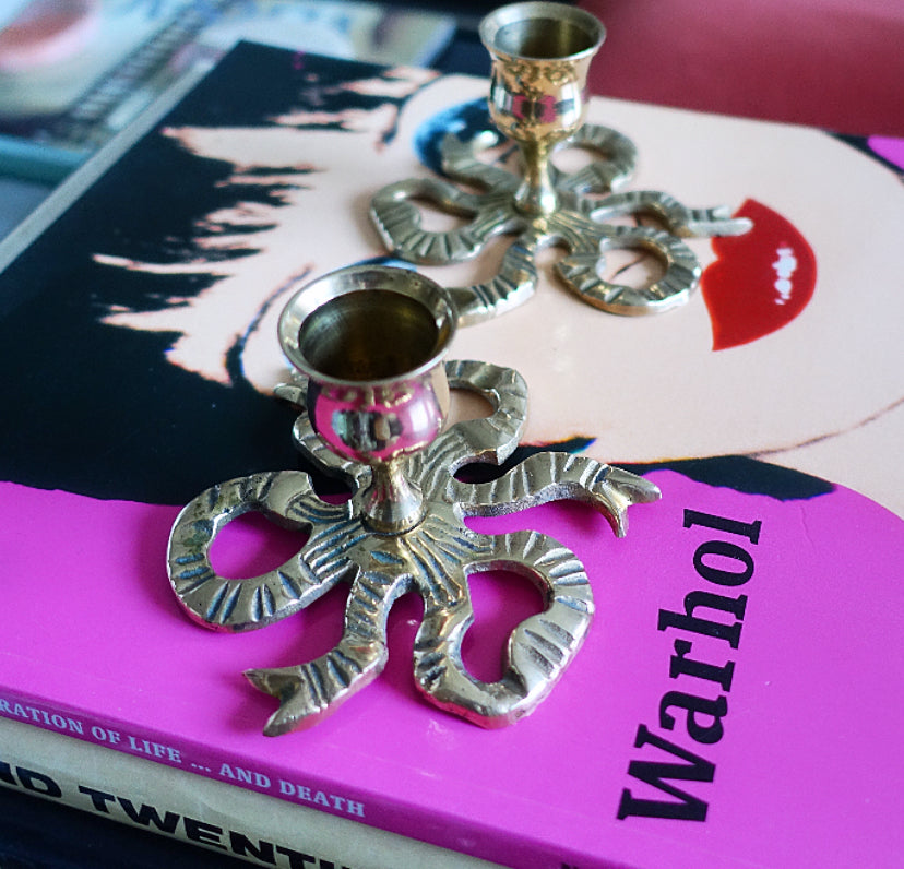 Pair of brass bow candle holders