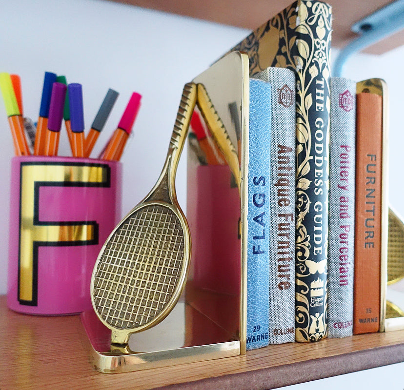 Pair of brass tennis racket bookends