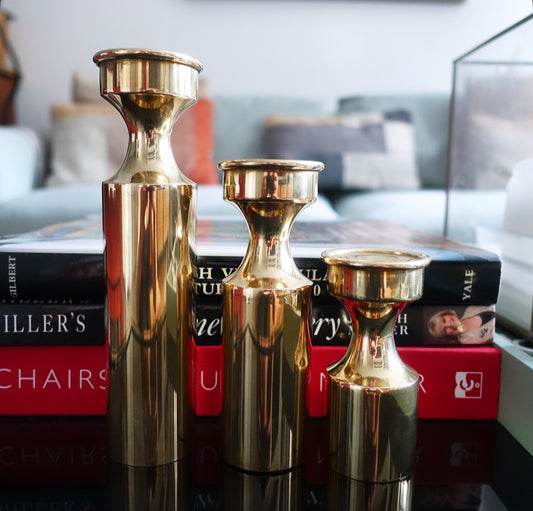 Set of three Danish brass candle holders