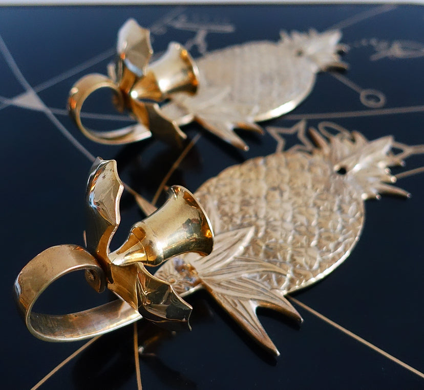 Pair of Hollywood Regency brass pineapple candle sconces