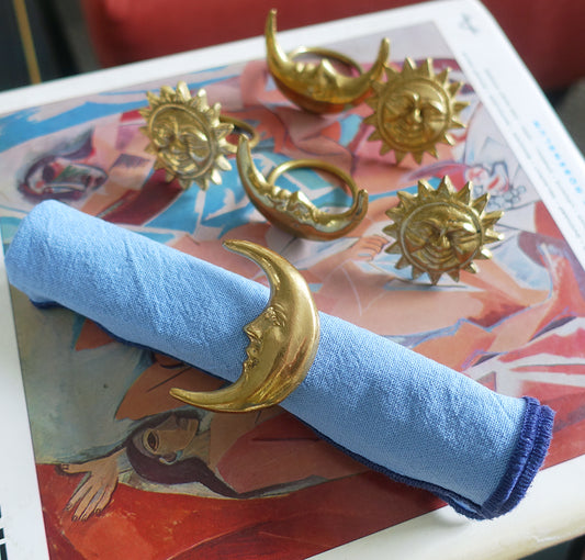 Set of six celestial brass napkin rings