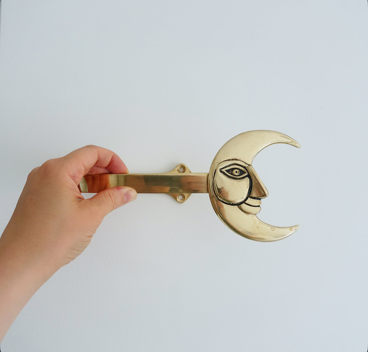 Brass moon curtain tie-backs