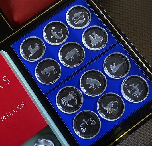 Set of 12 Val Saint Lambert zodiac coasters