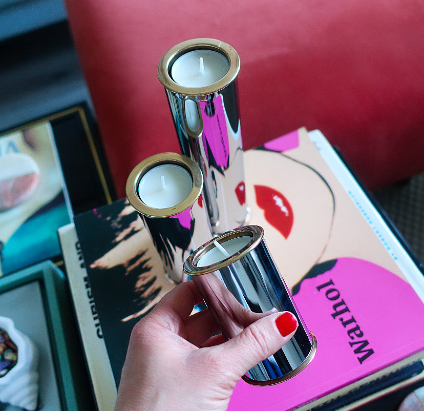 MCM Swedish chrome and brass candle holder set