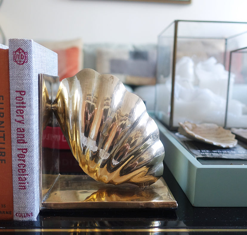 Pair of brass shell bookends