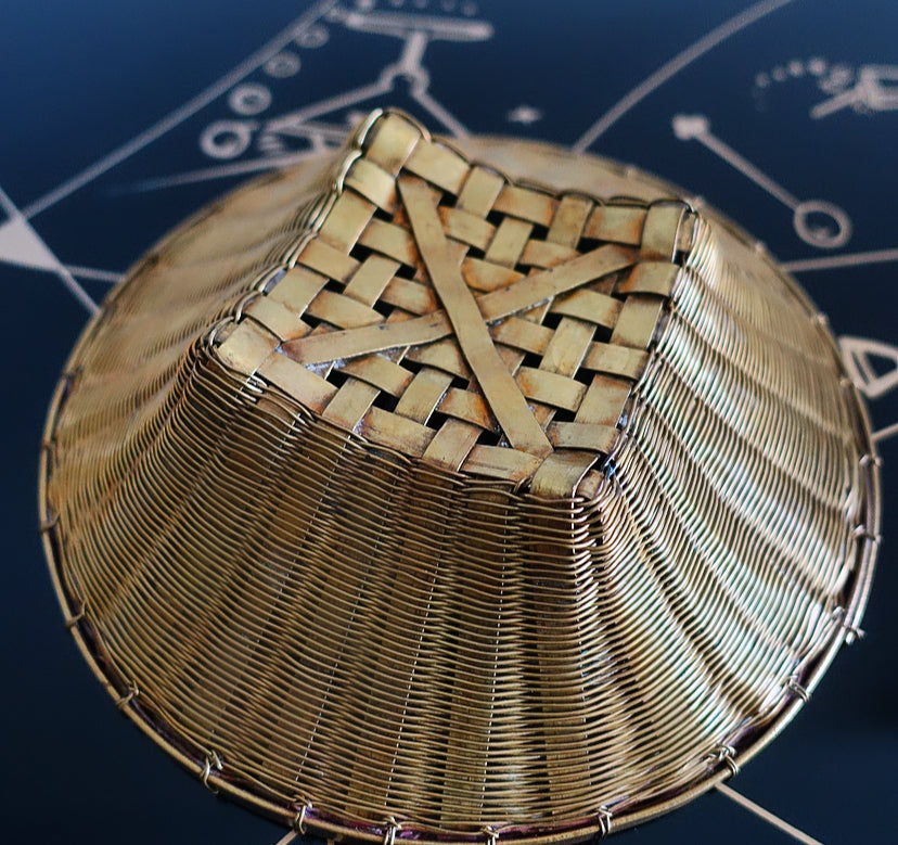 Vintage woven brass basket