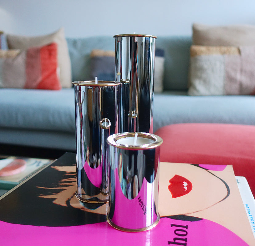 MCM Swedish chrome and brass candle holder set