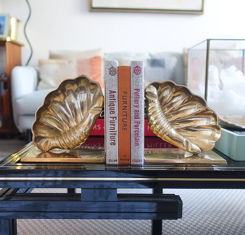 Pair of brass shell bookends