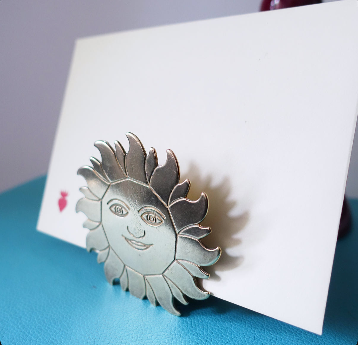 Brass sun letter holder