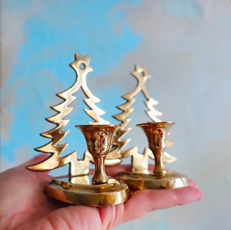 Pair of brass Christmas tree candle holders