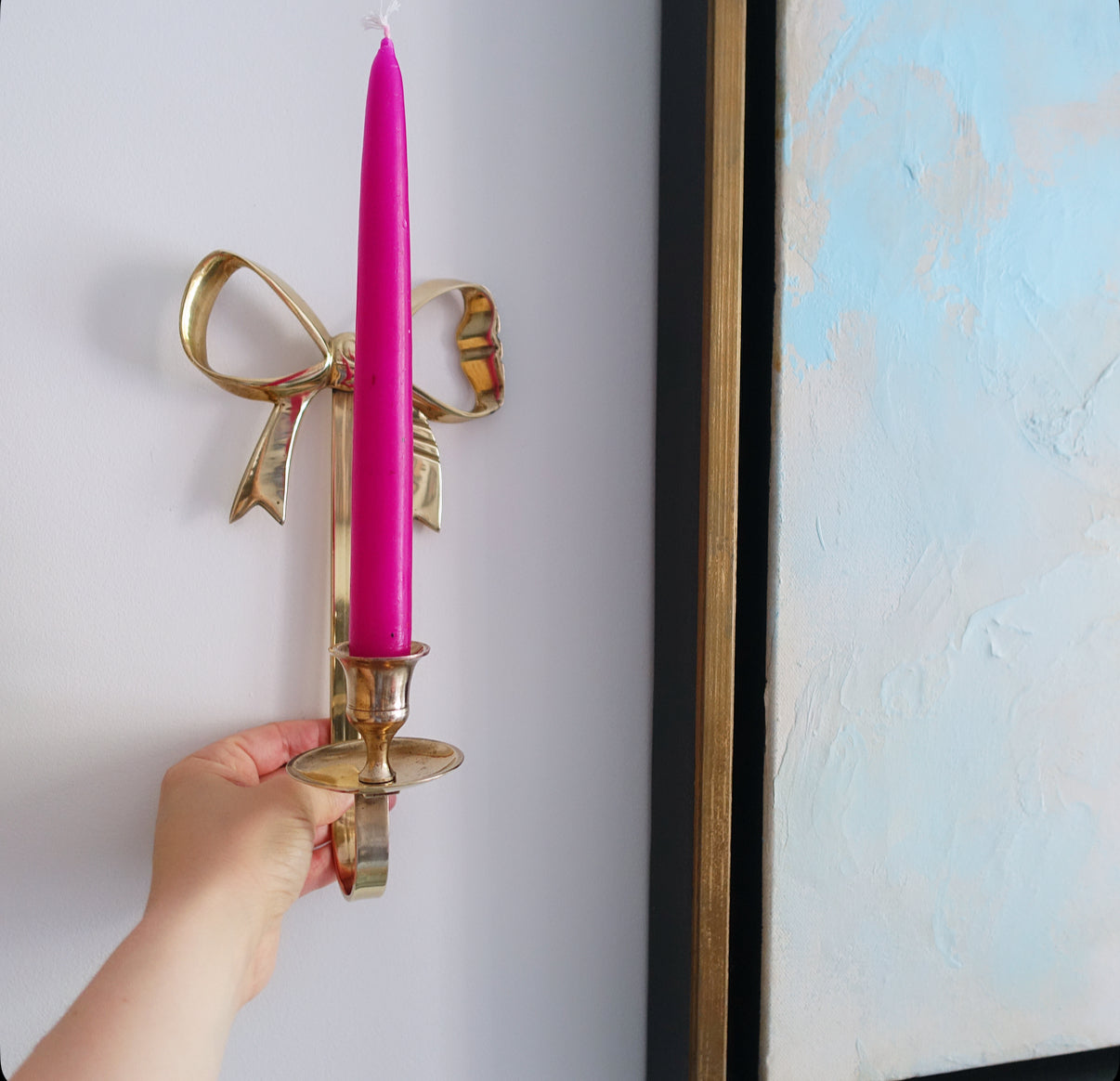 Pair of brass bow candle sconces