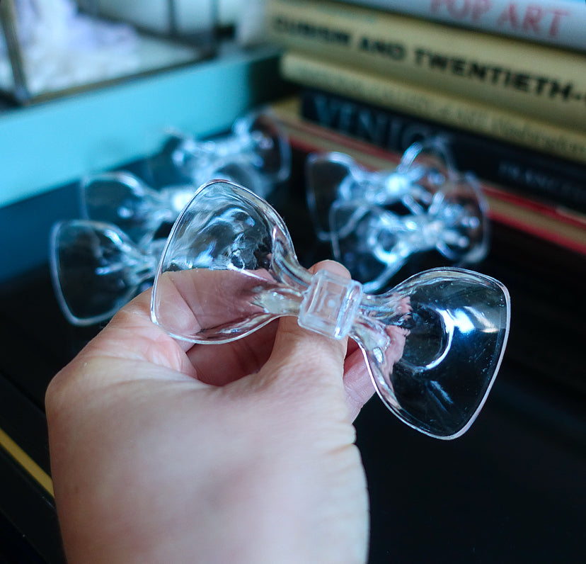 Set of six acrylic bow napkin rings