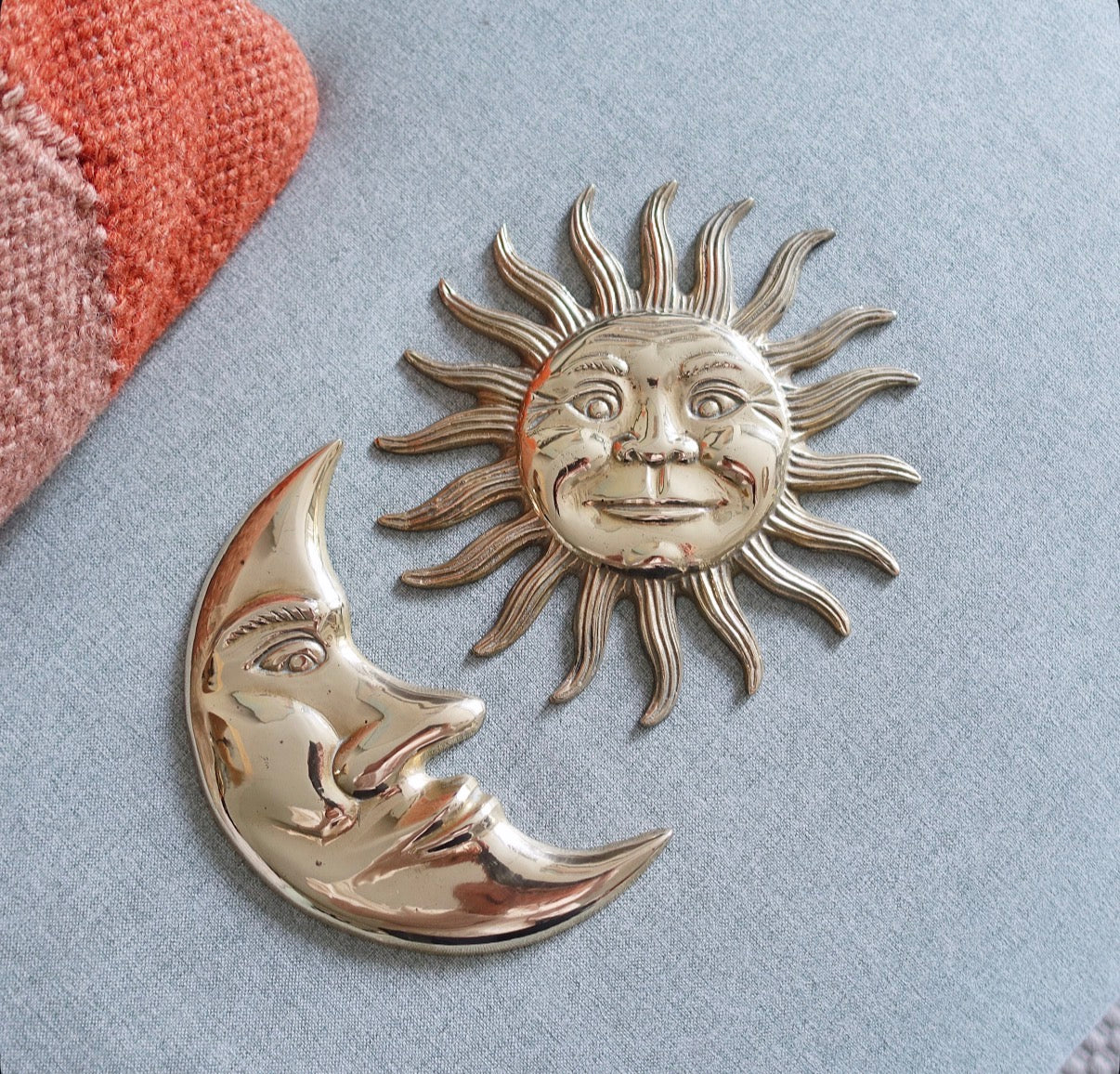 Brass sun & moon wall plaque set