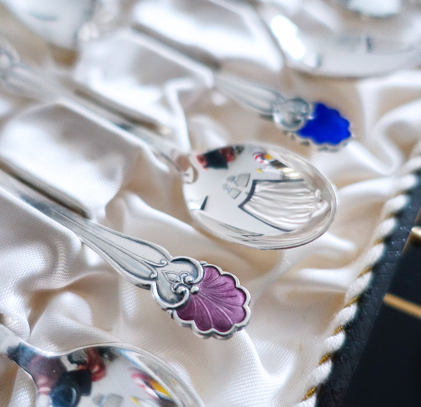 Cased set of six Danish Sterling silver & enamel shell spoons