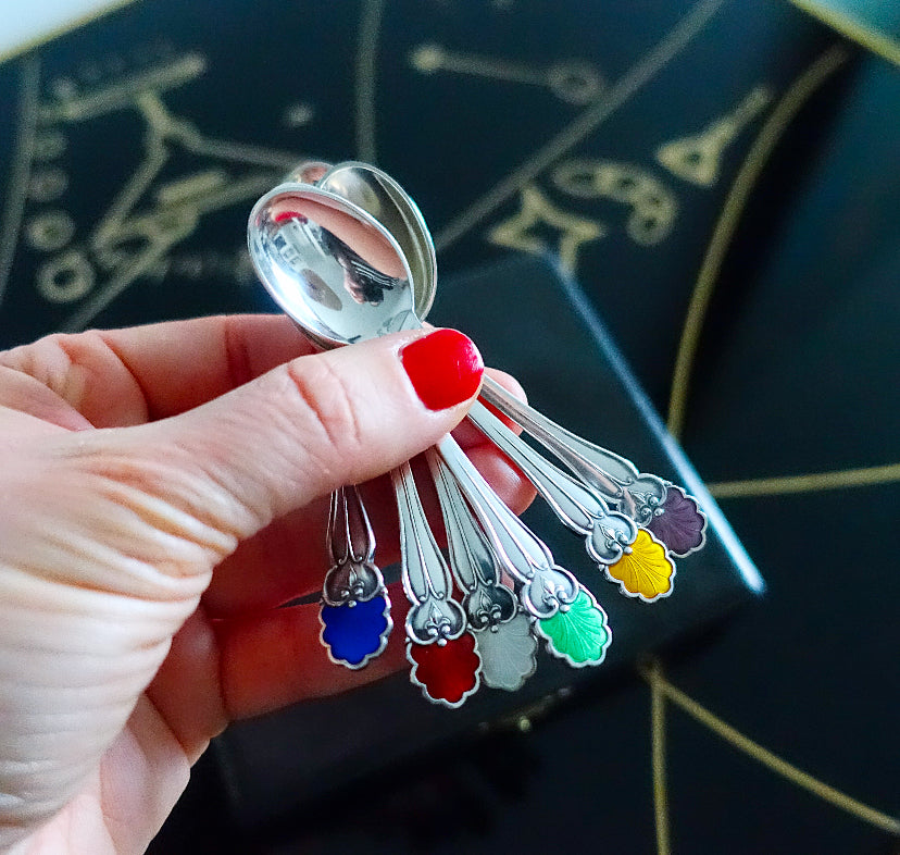 Cased set of six Danish Sterling silver & enamel shell spoons