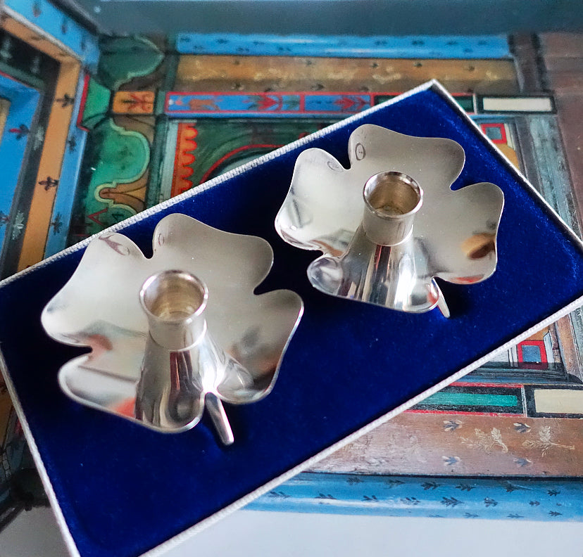 Pair of Swedish clover candle holders
