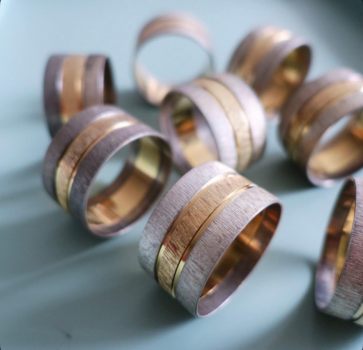 Silver & gold tone napkin rings