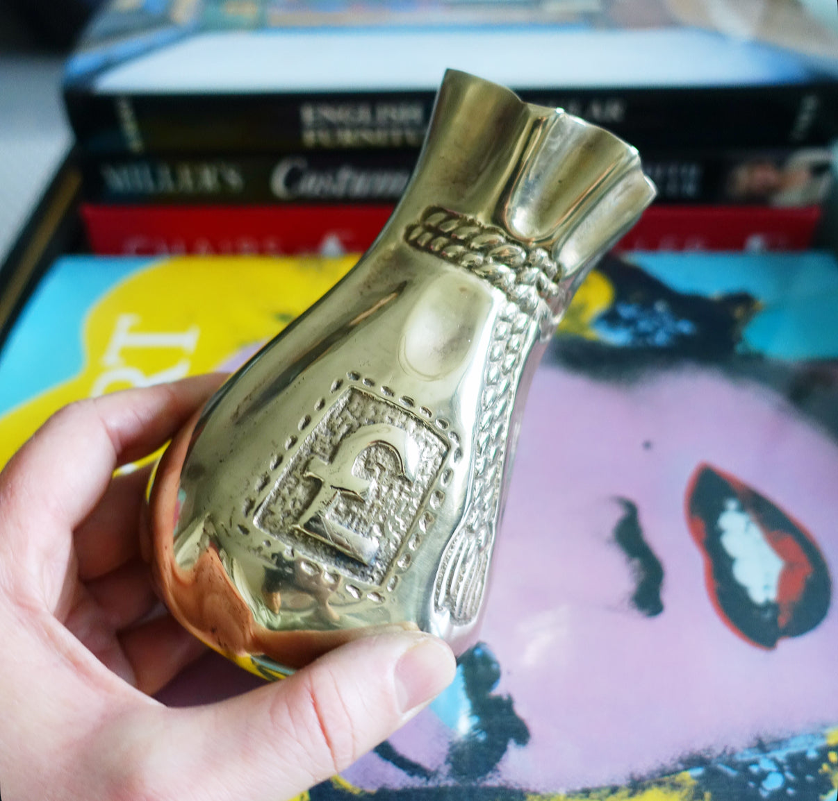 Brass swag bag coin bank