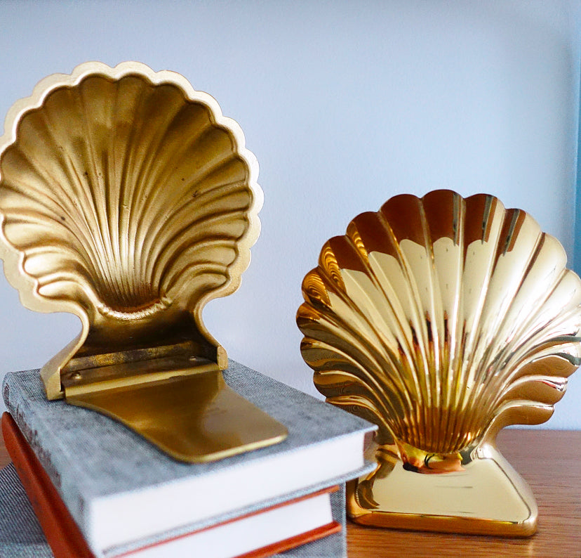 Pair of Hollywood Regency brass shell bookends
