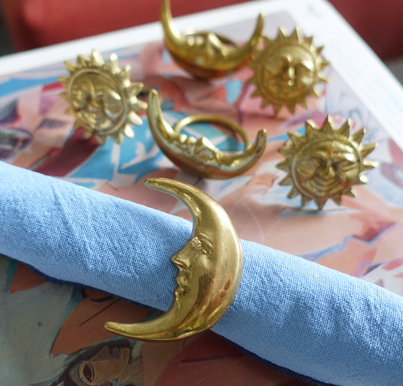 Set of six celestial brass napkin rings