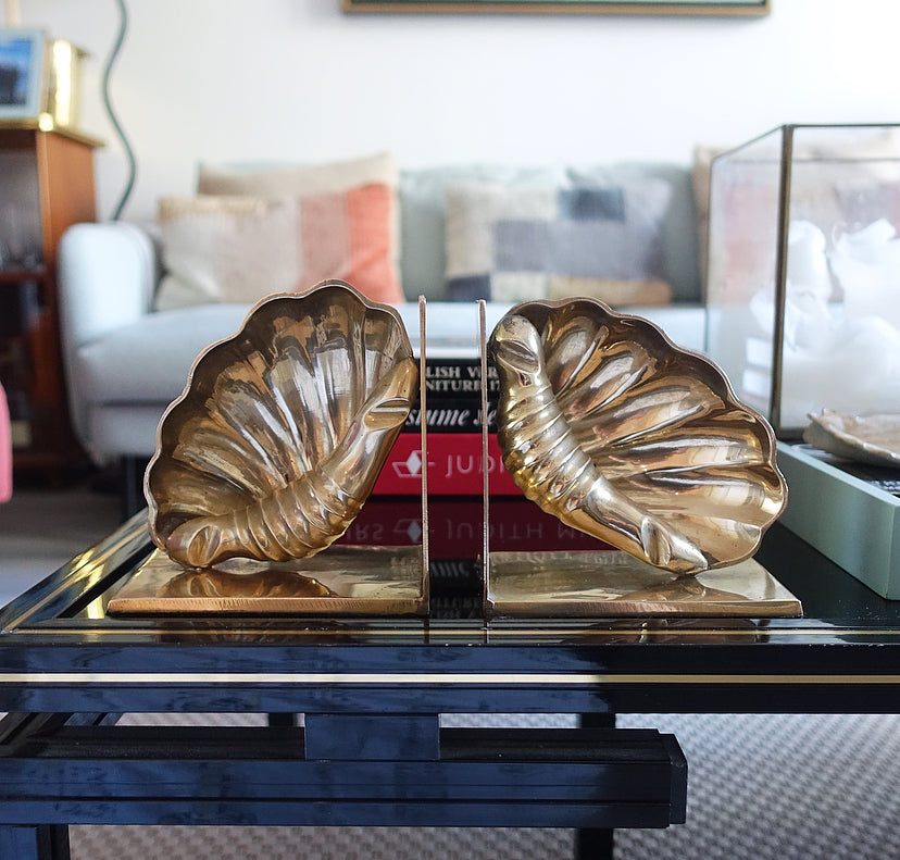 Pair of brass shell bookends