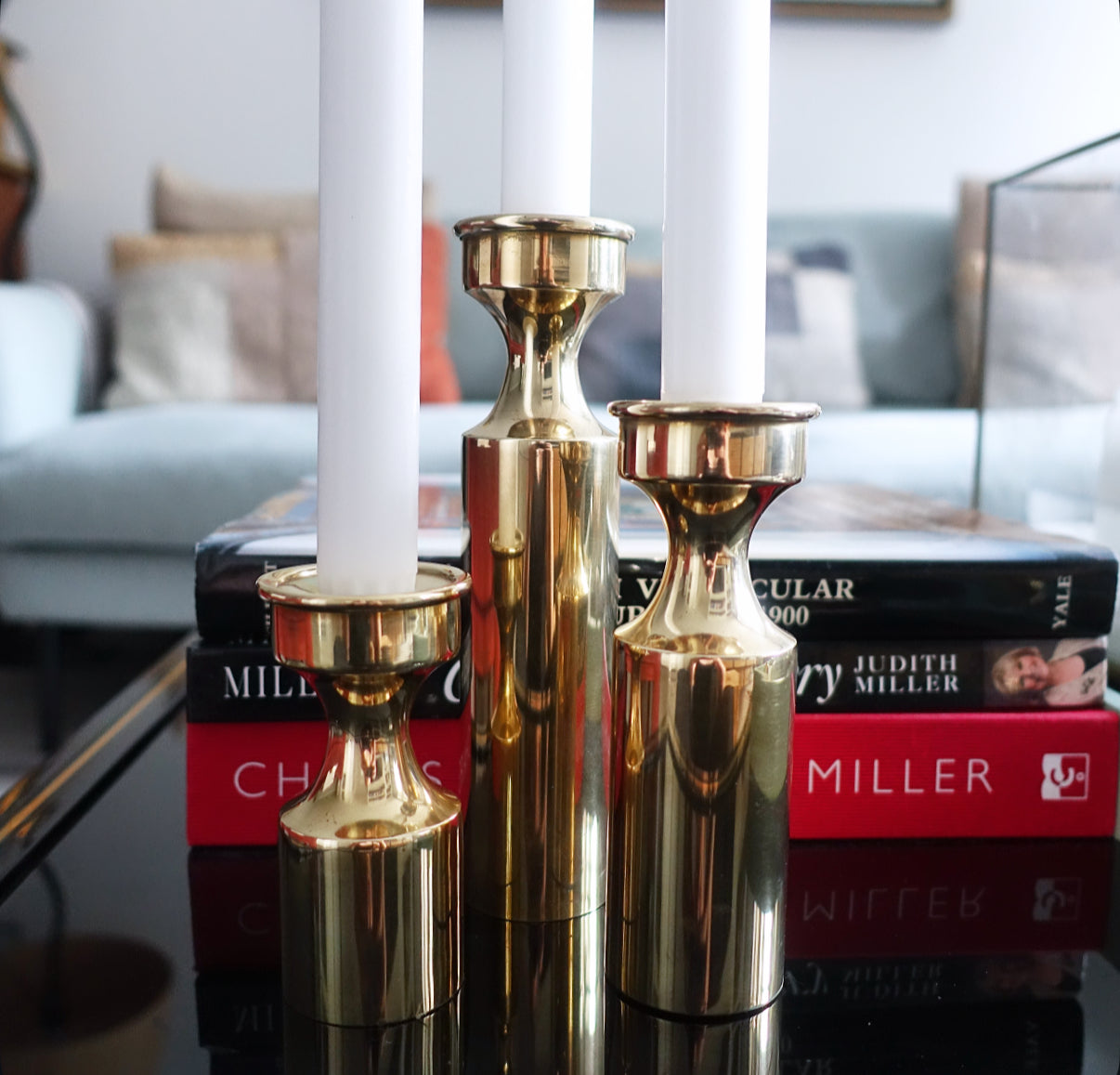 Set of three Danish brass candle holders
