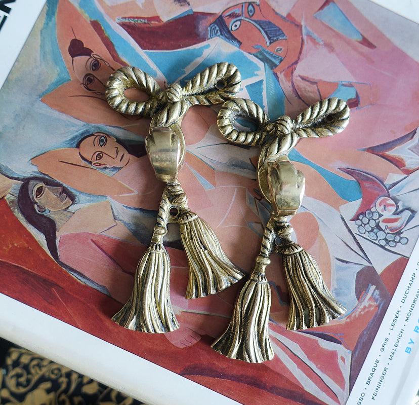 Pair 3: Pair of brass bow hooks