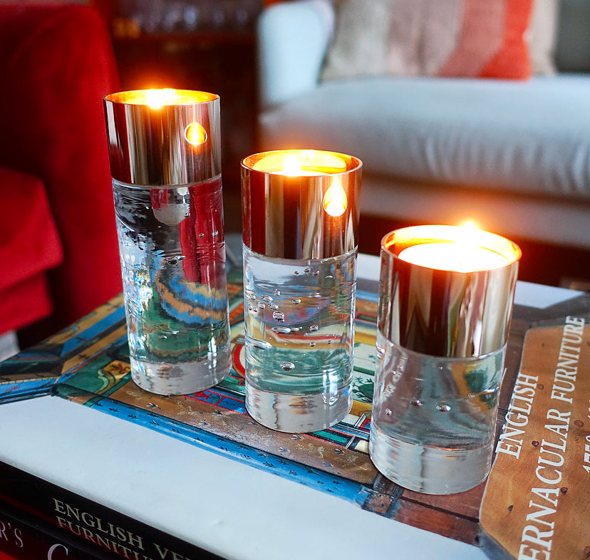 Set of three Swedish controlled bubble glass & brass candle holders