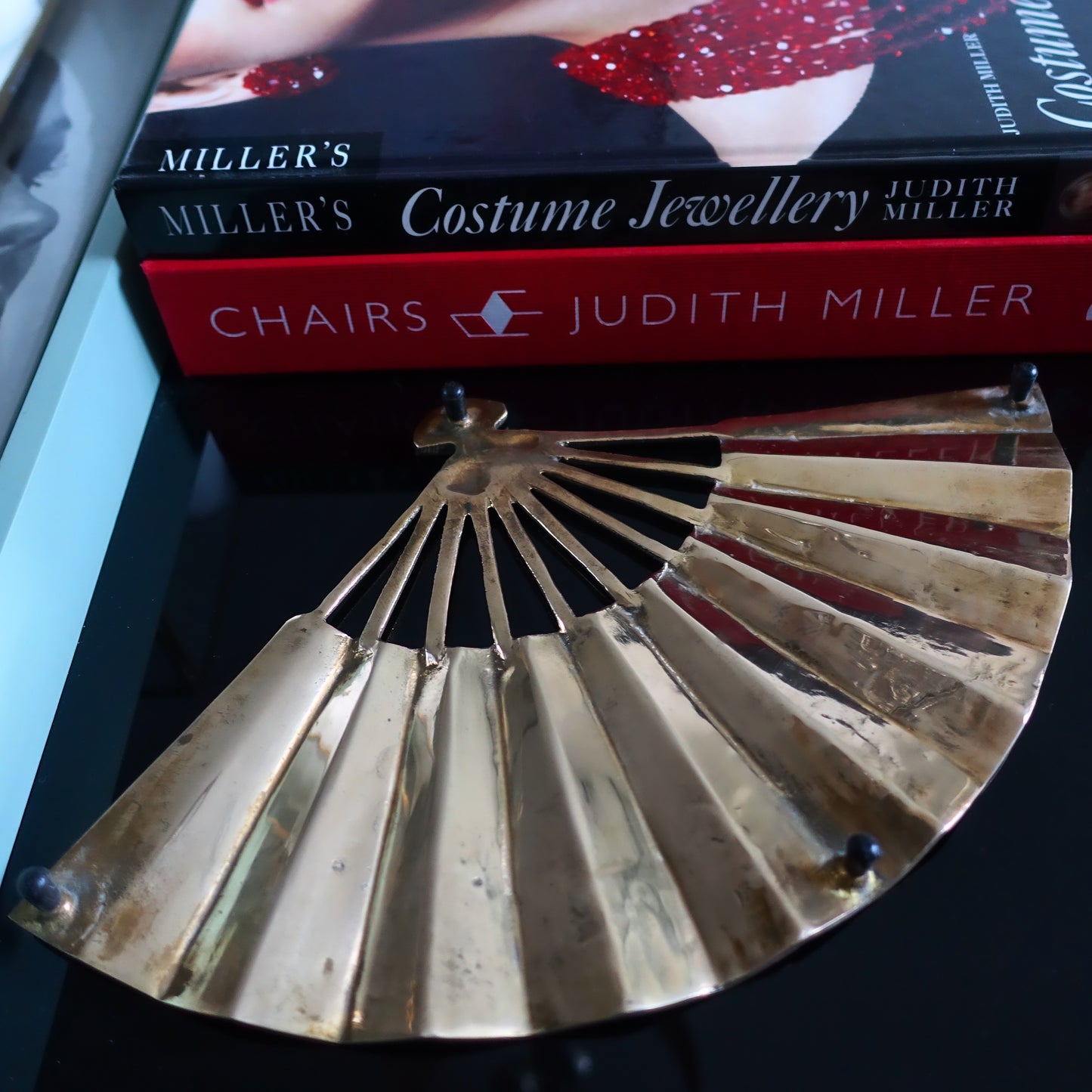 Hollywood Regency brass fan trivet
