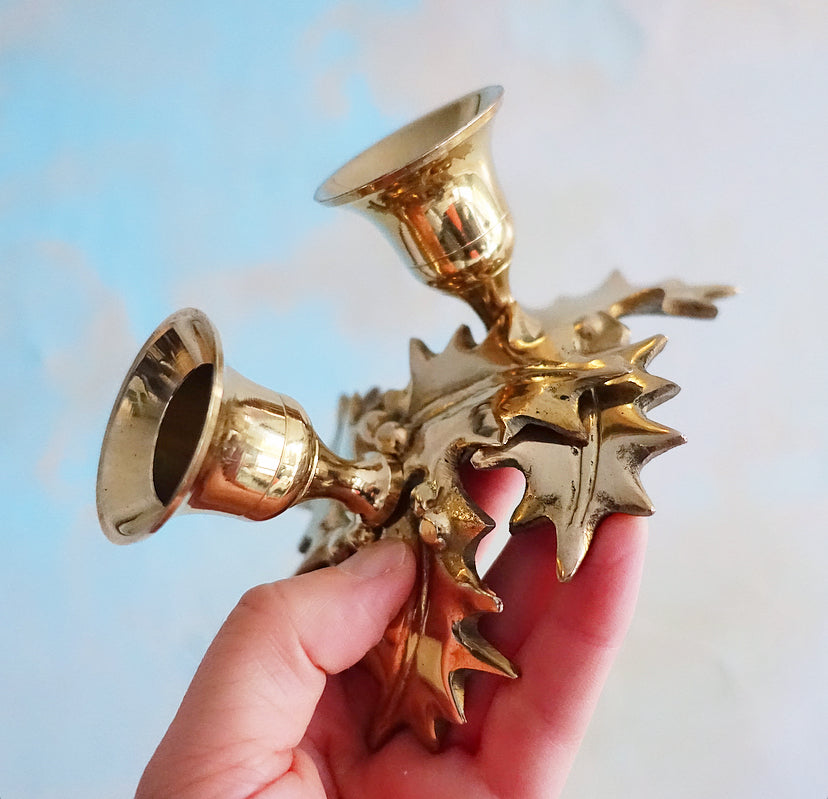 Pair of small brass Holly leaf candle holders